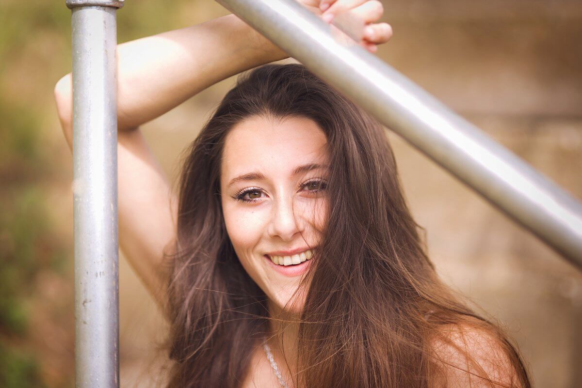 looking through rails outdoor personal portraits