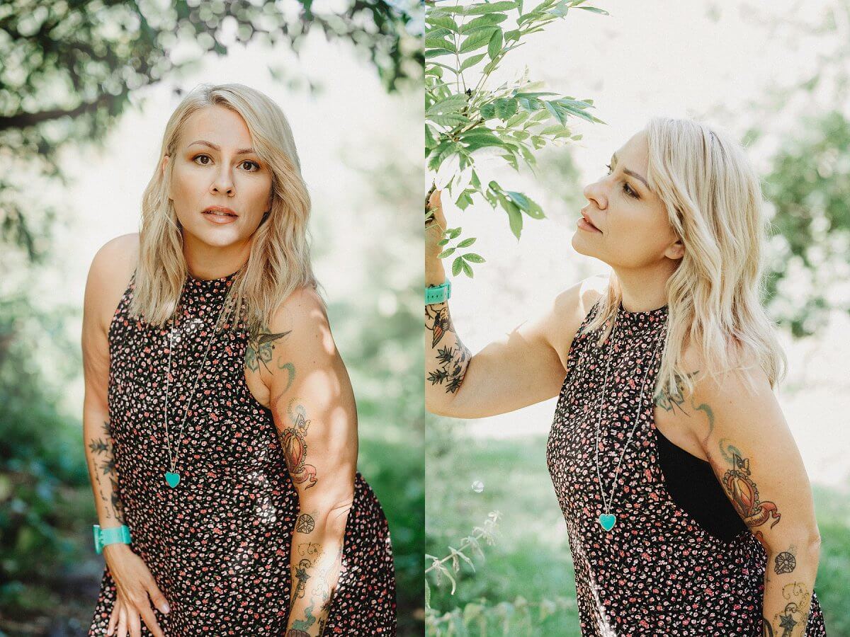 mature older woman plays with trees