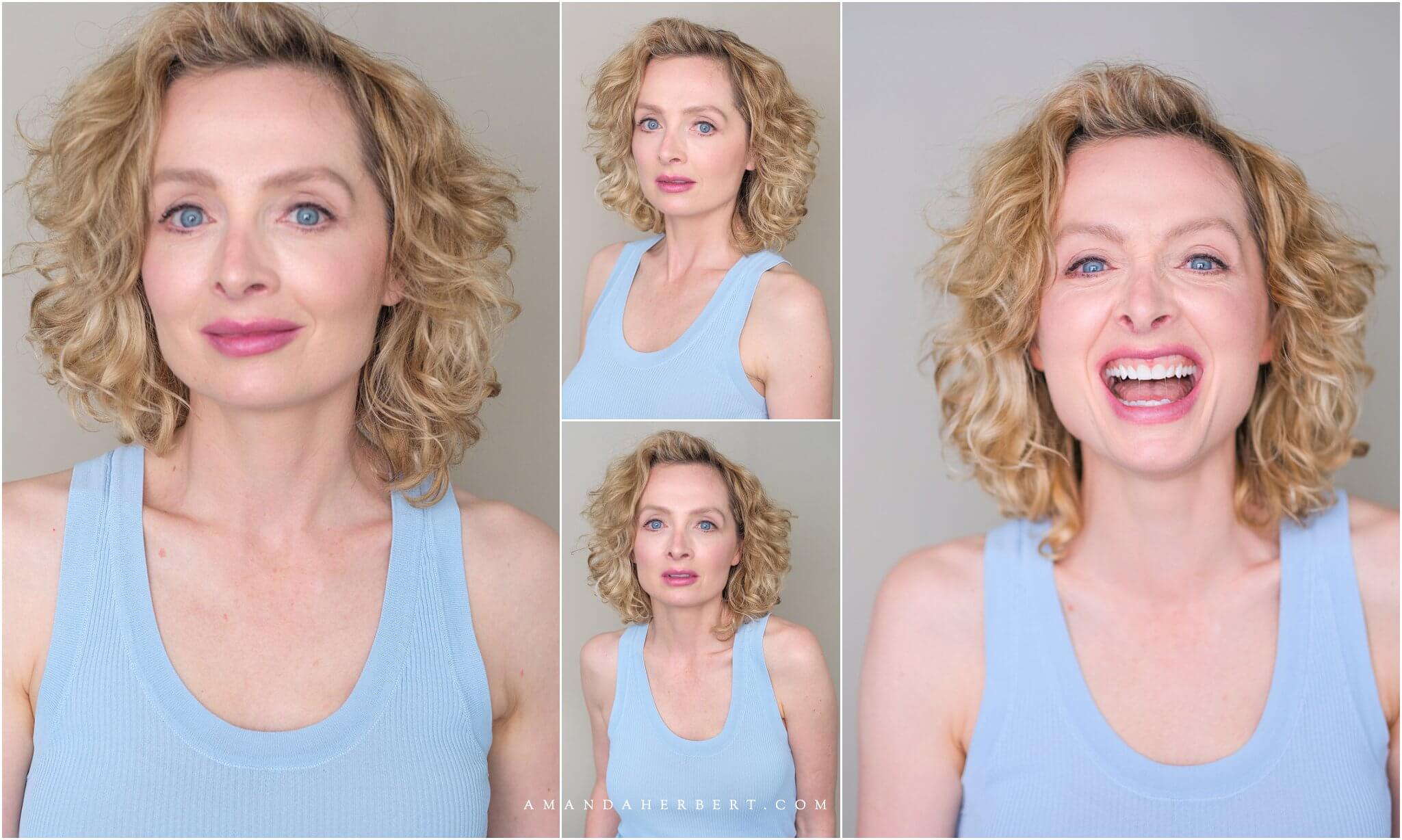 Actor blue vest top broad smile for headshot